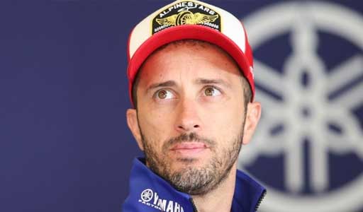 Andrea Dovizioso on the grid preparing for a MotoGP race