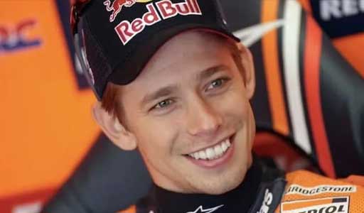 Casey Stoner leaning deep into a turn on a MotoGP bike