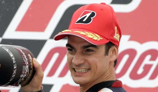 Dani Pedrosa riding a MotoGP bike into a corner