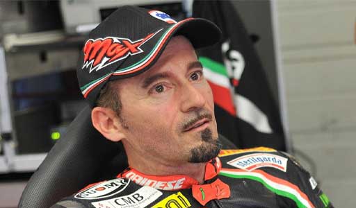 Max Biaggi celebrating on the MotoGP podium