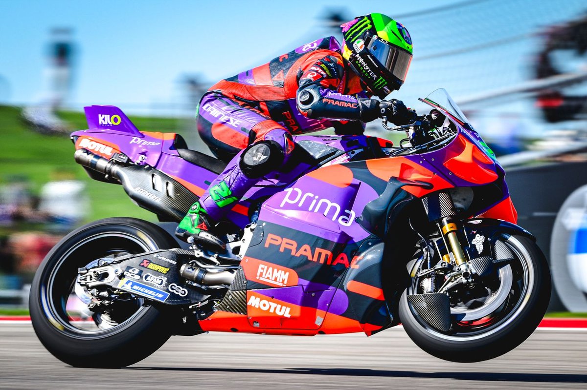 Franco Morbidelli leaning into a corner during a Moto3 race