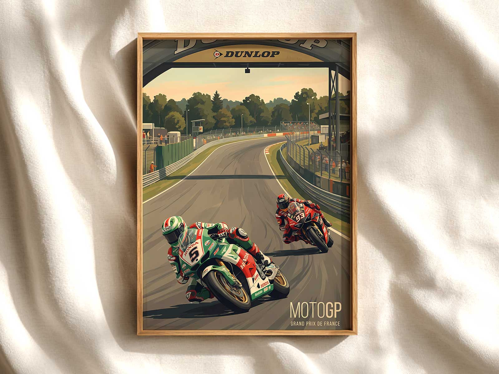 Honda MotoGP bike leaned sharply through a corner with knee skimming the asphalt and blurred trackscape conveying motion