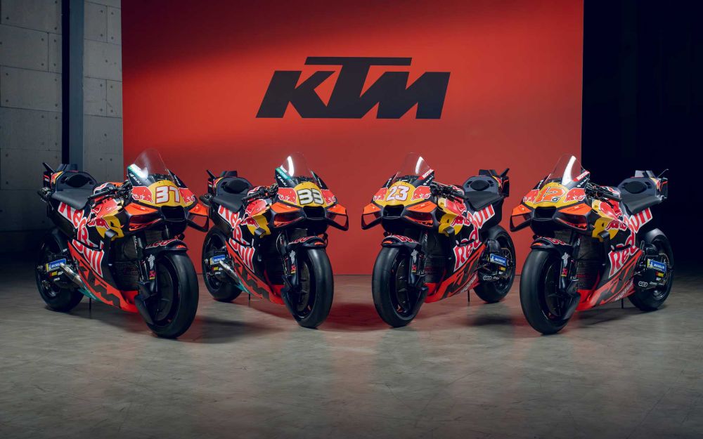 Close-up of the KTM RC16 engine and exhaust assembly highlighting compact packaging