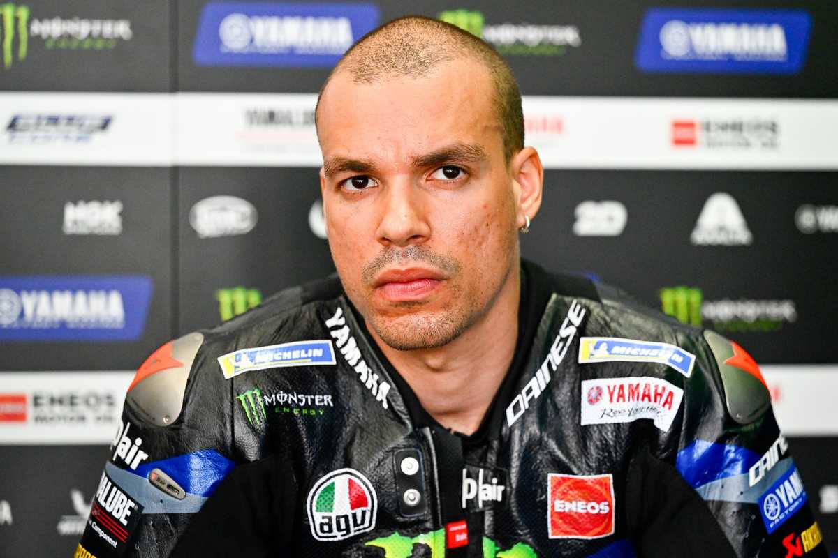 Morbidelli standing the bike up under heavy braking with calm posture and minimal front-end chatter