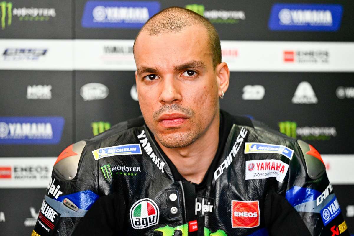 Morbidelli standing the bike up under heavy braking with calm posture and minimal front-end chatter