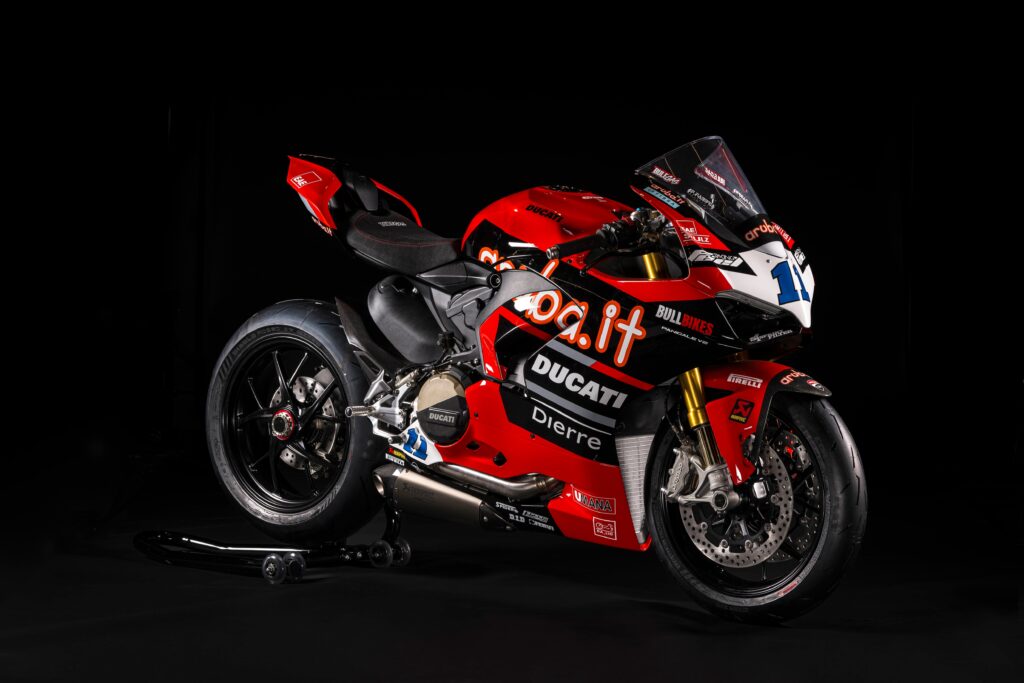 Side profile of a Ducati Panigale on a showroom floor highlighting its road-legal components and bodywork